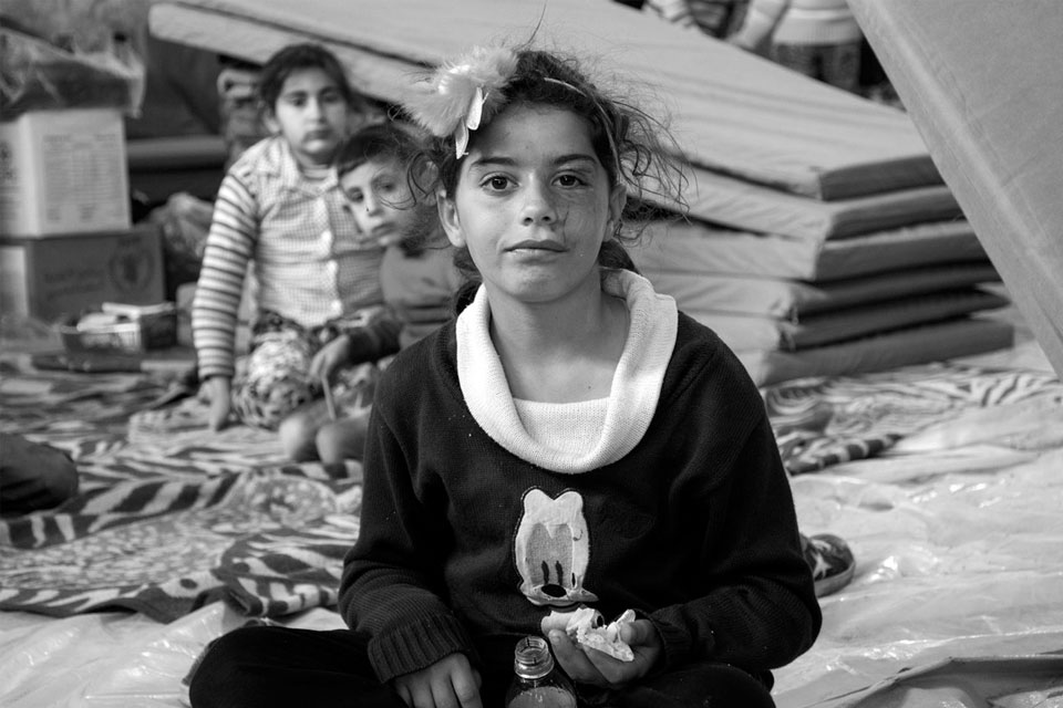 Geflüchtete Familie aus Afrin in einer UNHCR-Unterkunft © UNHCR/Hameed Maarouf